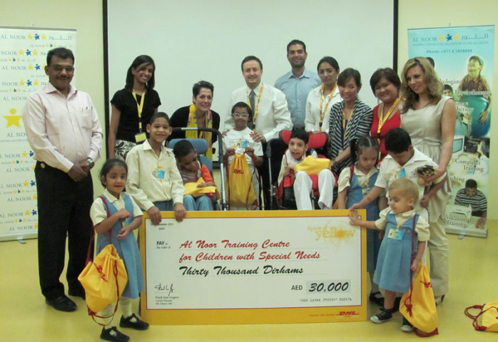 As part of DHL's CSR initiative, staff donated AED30000 to the Al Noor Centre for Children with Special Needs. As part of DHL's CSR initiative, staff donated AED30000 to the Al Noor Centre for Children with Special Needs.