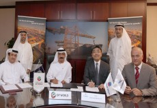 Representatives from DP World sign $850m JV contract with TOA-Soletanche Bachy. Representatives from DP World sign $850m JV contract with TOA-Soletanche Bachy.
