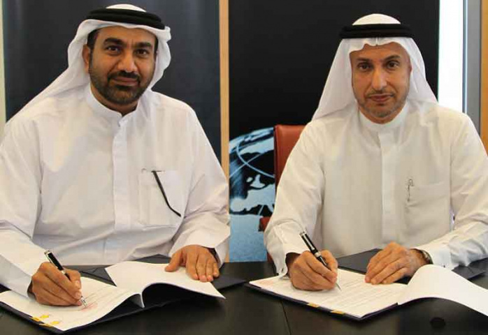 Dr. Mohammed Al Zarooni, Director General of DAFZA and Hesham Abdulla Al Qassim, CEO, Wasl Asset Management Group. Dr. Mohammed Al Zarooni, Director General of DAFZA and Hesham Abdulla Al Qassim, CEO, Wasl Asset Management Group.
