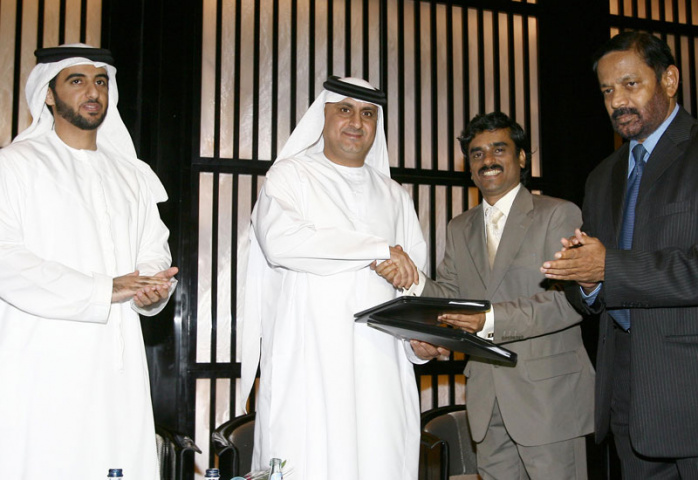 (L to R) Hazza Bin Mohammed Al Dhahri, chairman, JRG International, Mahmood Al Bastaki, director, Dubai Trade, Sajith Kumar P K, director and CEO, JRG (L to R) Hazza Bin Mohammed Al Dhahri, chairman, JRG International, Mahmood Al Bastaki, director, Dubai Trade, Sajith Kumar P K, director and CEO, JRG