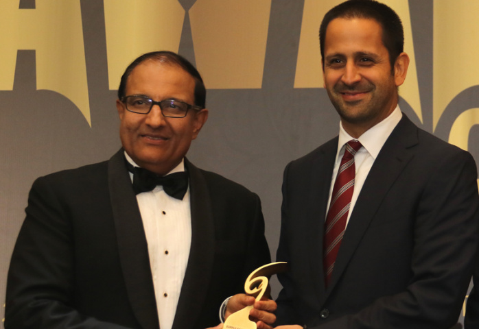 Essa Al-Saleh (right) receiving his award. Essa Al-Saleh (right) receiving his award.