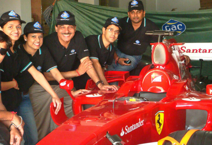 GAC India logistics team with the F1 Ferrari replica GAC India logistics team with the F1 Ferrari replica