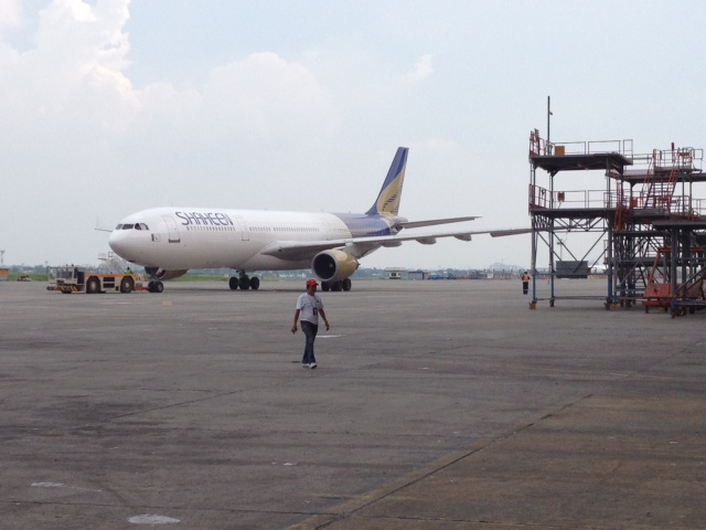 Dubai-bound airliner operated by Shaheen Air evacuated in Pakistan due to alleged bomb threat. Dubai-bound airliner operated by Shaheen Air evacuated in Pakistan due to alleged bomb threat.