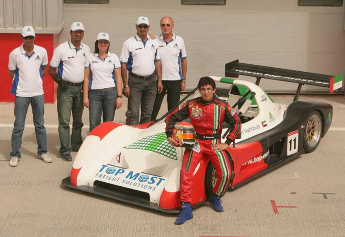 Members of the TMFS team pose with young Emirati driving sensation Sultan Mahboubi. Members of the TMFS team pose with young Emirati driving sensation Sultan Mahboubi.