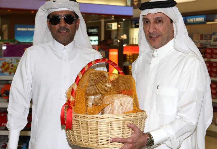 The first person to arrive at Doha's new terminal receives a sumptuous hamper. The first person to arrive at Doha's new terminal receives a sumptuous hamper.
