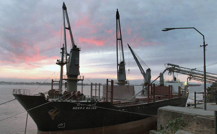 INFLATED: A bulk carrier is filled with wheat in Rosario, Argentina. Freight rates for grain have been outstripped by iron ore, but the market as a wh INFLATED: A bulk carrier is filled with wheat in Rosario, Argentina. Freight rates for grain have been outstripped by iron ore, but the market as a wh
