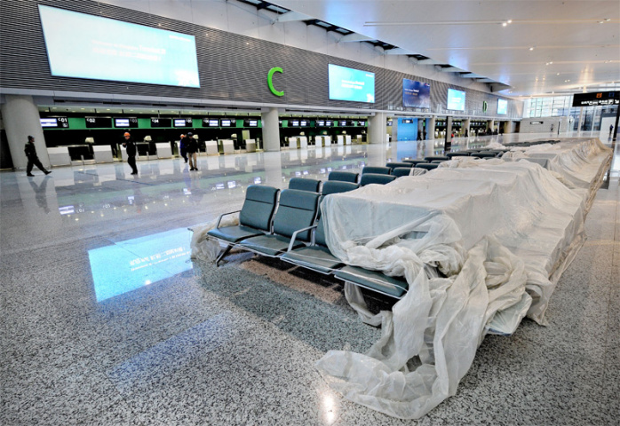The final touches are applied to Hongqiao's Terminal 2 ahead of its opening last year (Philippe Lopez/AFP/Getty Images). The final touches are applied to Hongqiao's Terminal 2 ahead of its opening last year (Philippe Lopez/AFP/Getty Images).
