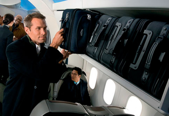 ILLUSION OF SPACE: The 787 Dreamliner is designed and laid out to feel spacious, even down to the overhead luggage bins. ILLUSION OF SPACE: The 787 Dreamliner is designed and laid out to feel spacious, even down to the overhead luggage bins.