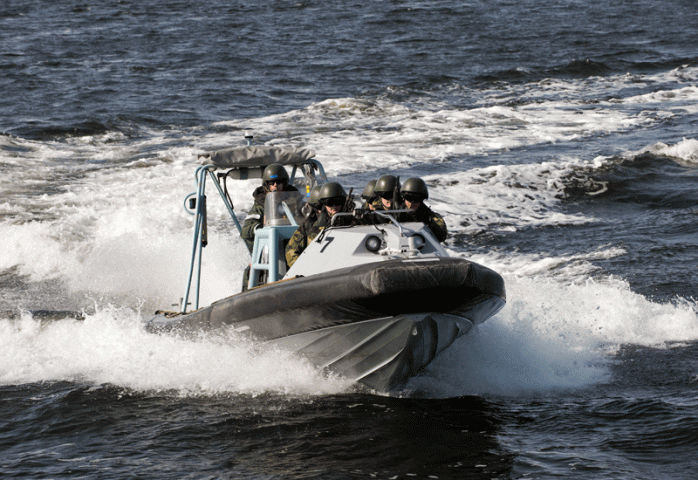 Combat-ready soldiers on a Swedish naval speedboat take part in a training exercise to prepare them for operations off Somalia starting from 15th May. Combat-ready soldiers on a Swedish naval speedboat take part in a training exercise to prepare them for operations off Somalia starting from 15th May.