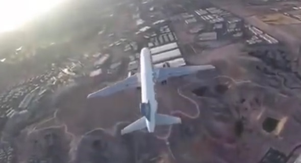 Police are investigating after video footage emerged on YouTube of a drone flying extremely close to a passenger jet thats about to land. Police are investigating after video footage emerged on YouTube of a drone flying extremely close to a passenger jet thats about to land.