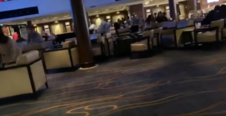 Passengers and furniture slid across the floor as the ship tilted in the strong winds. Passengers and furniture slid across the floor as the ship tilted in the strong winds.
